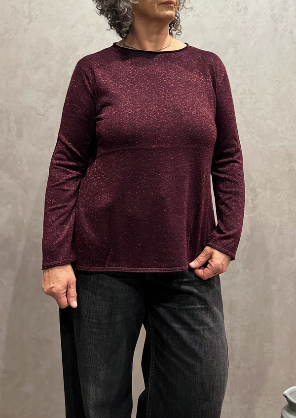 Maglia svasata in filo lurex con spacchi