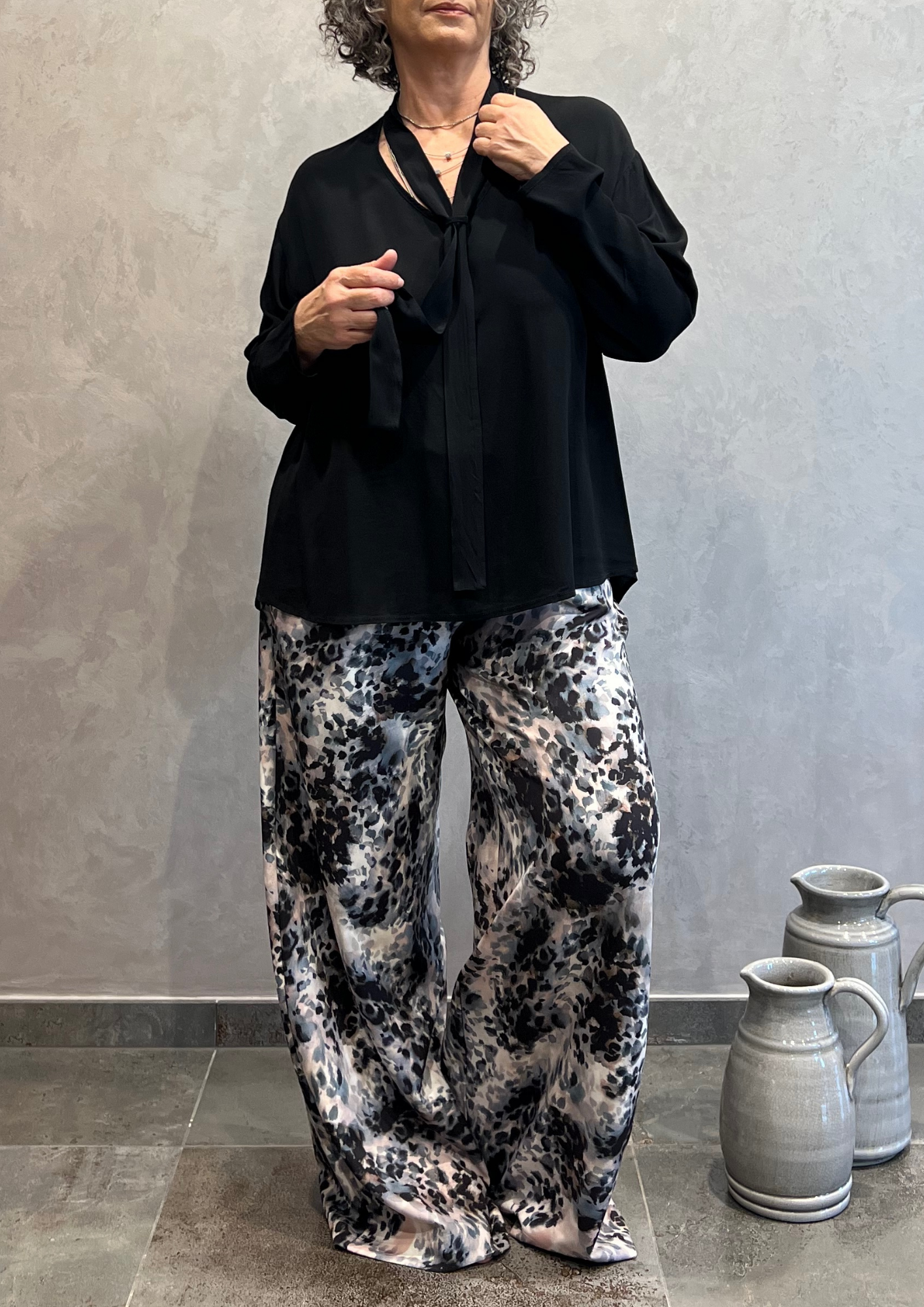 Blusa over con laccio in viscosa lucida