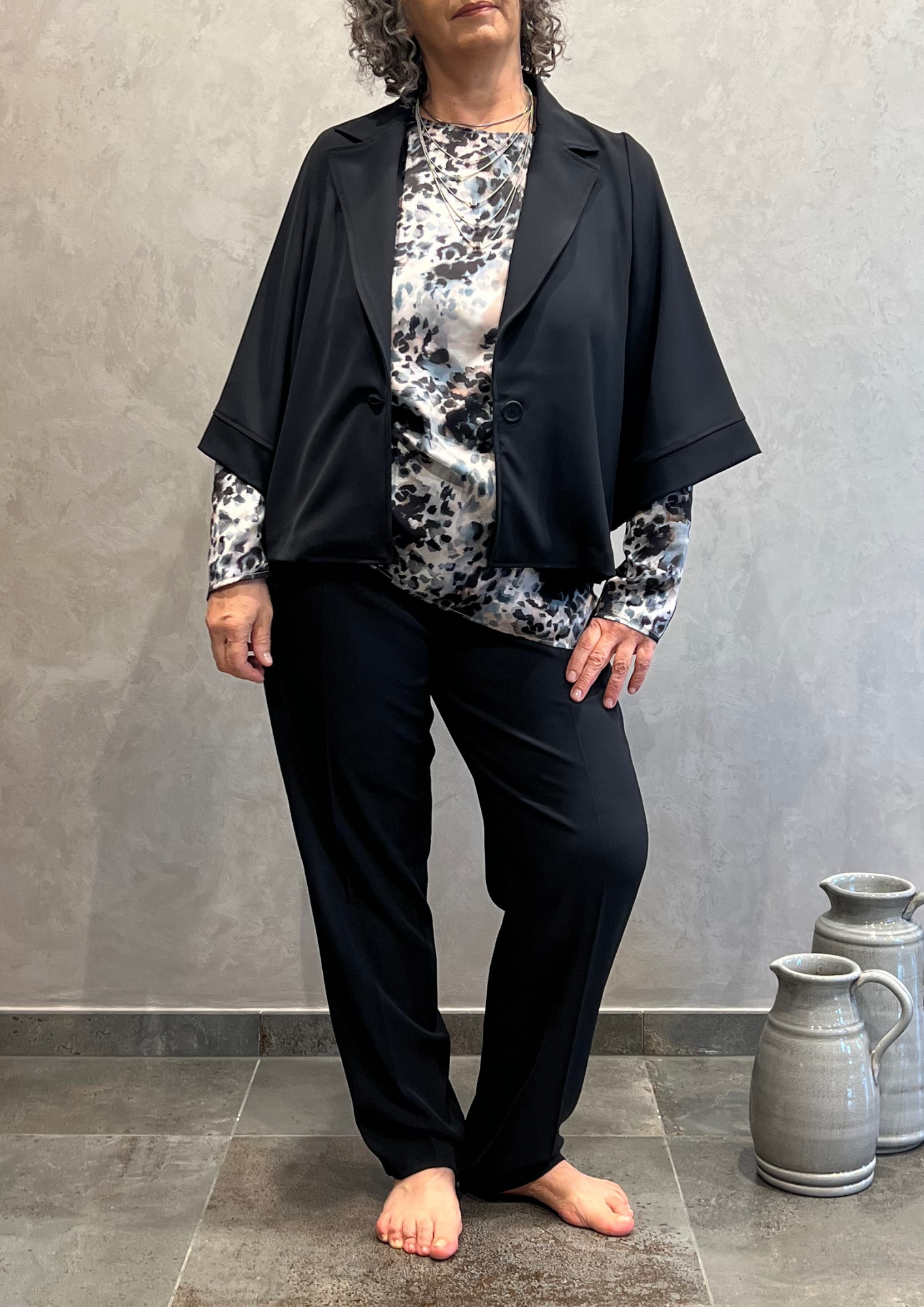 Blusa over svasata in fantasia animalier