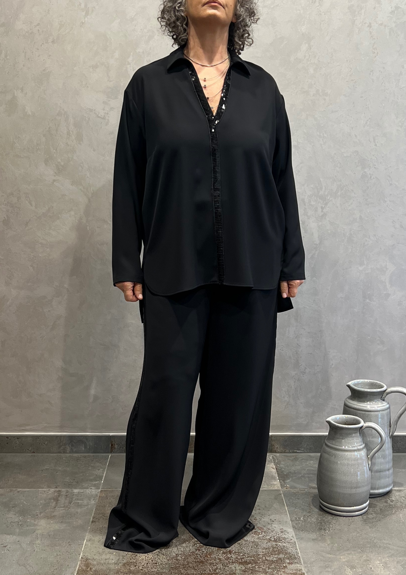 Pantalone over a palazzo con dettaglio paillettes