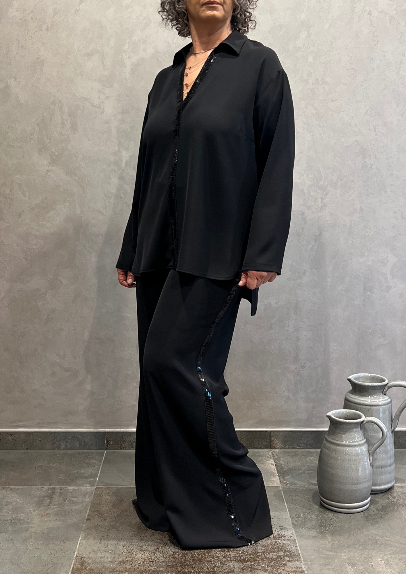 Pantalone over a palazzo con dettaglio paillettes