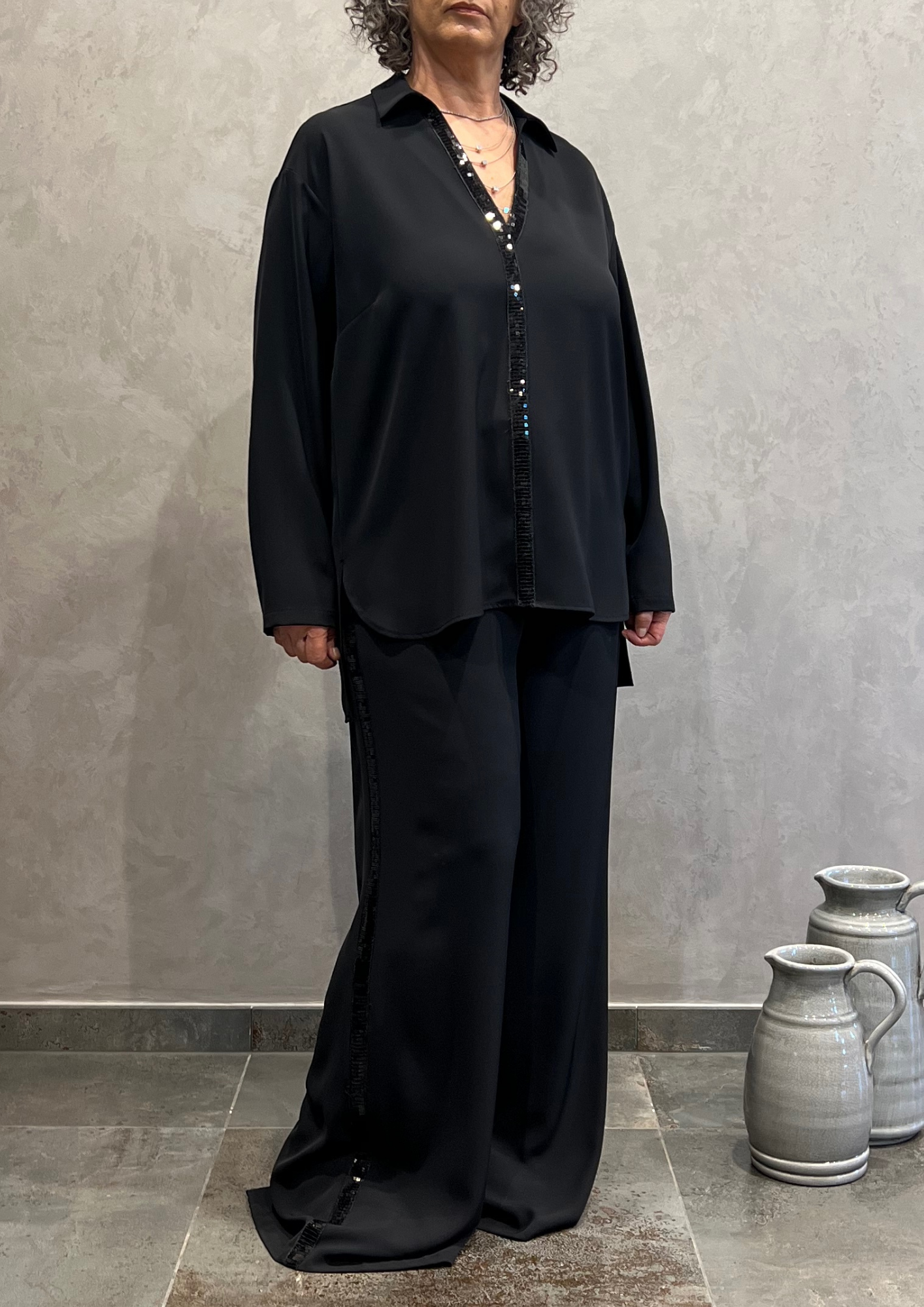 Pantalone over a palazzo con dettaglio paillettes