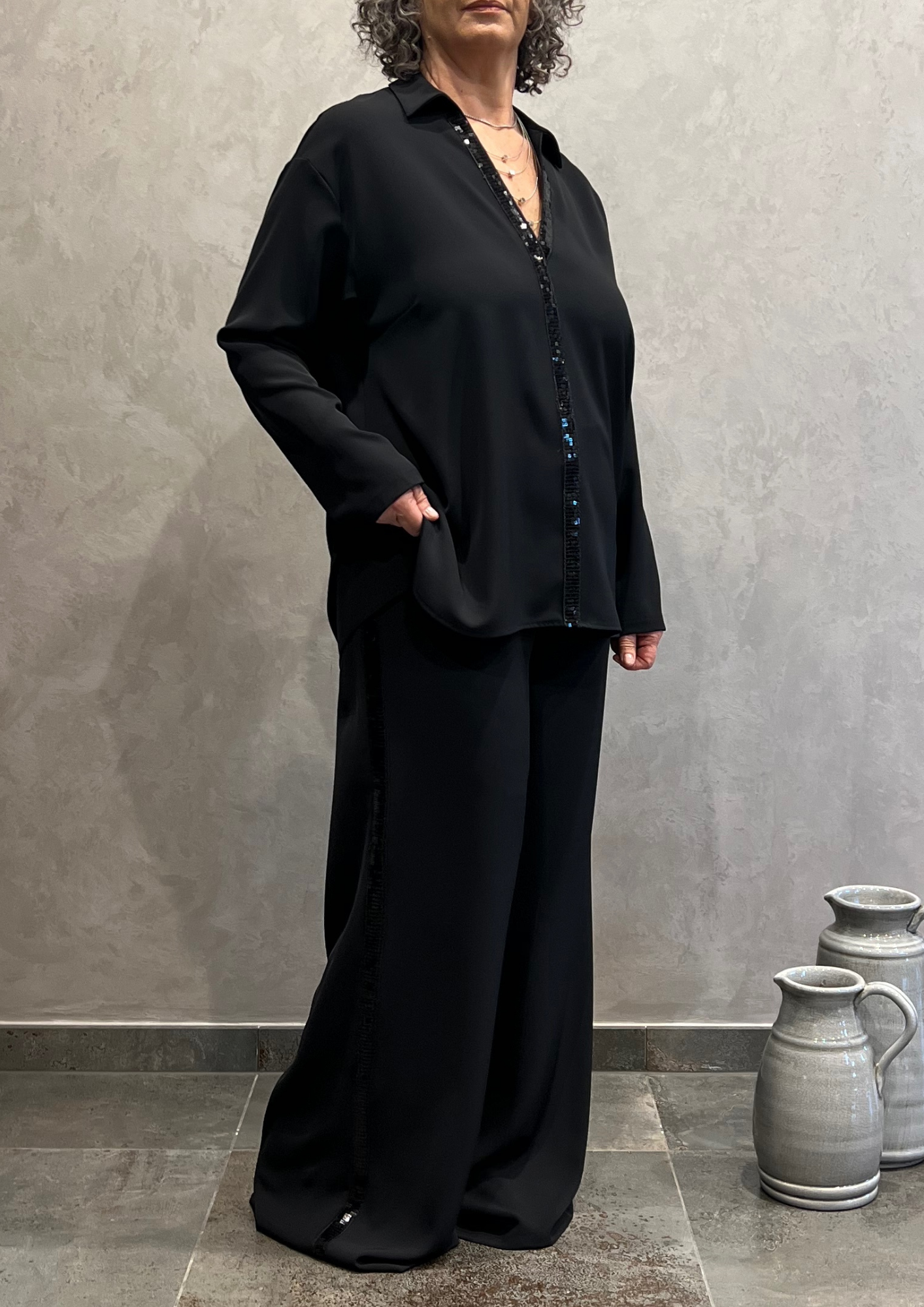 Pantalone over a palazzo con dettaglio paillettes