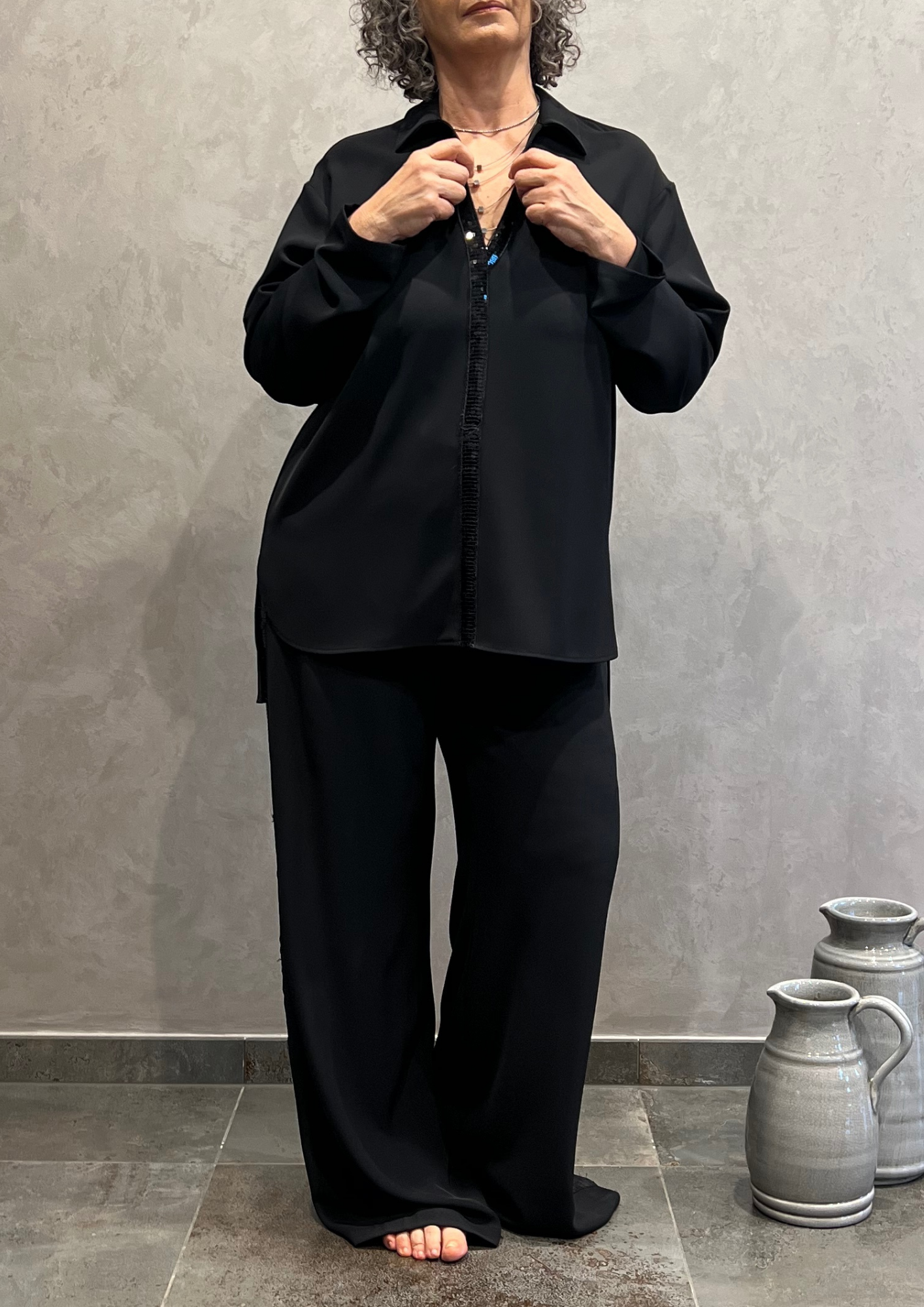 Pantalone over a palazzo con dettaglio paillettes