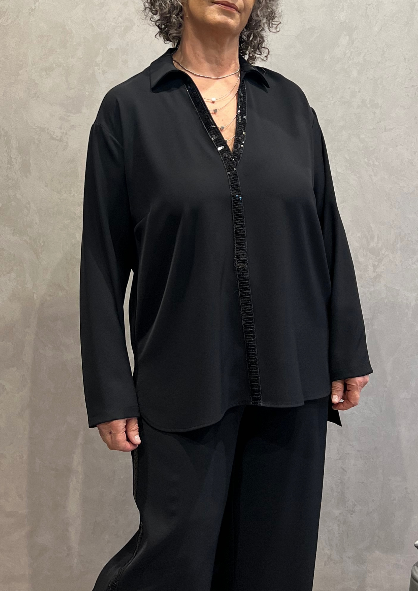 Blusa over svasata con dettaglio paillettes