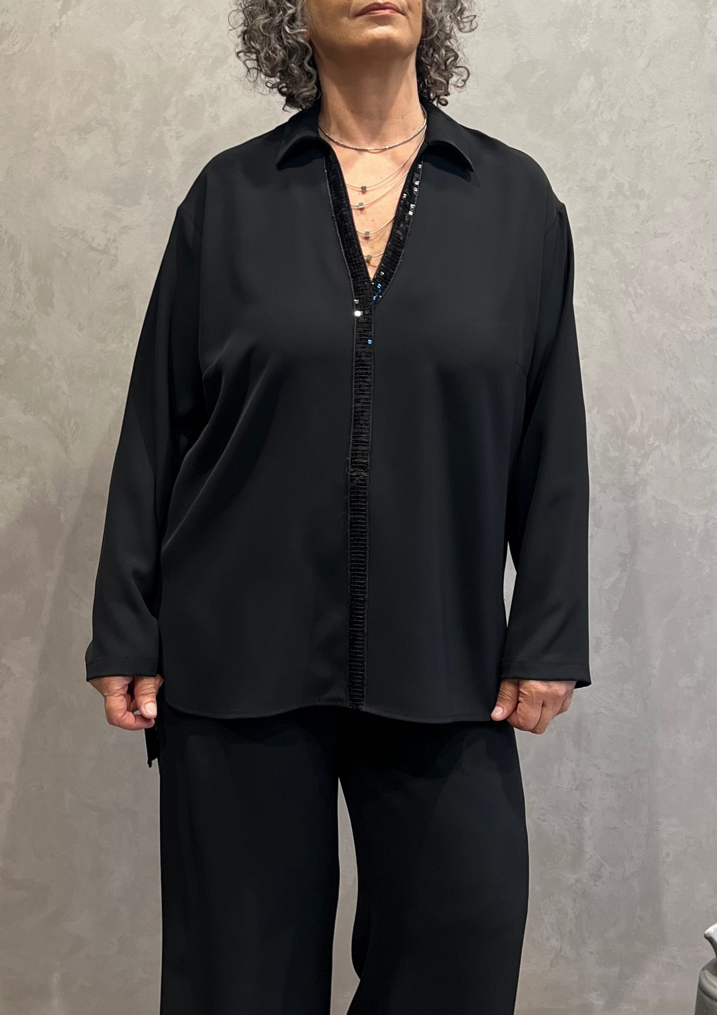 Blusa over svasata con dettaglio paillettes